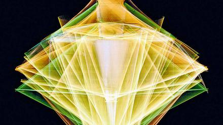 Für Fotoabzüge wie „Spin 07 (green brown)“ hat das Künstlerduo Taiyo Onorato & Nico Krebs eigens eine Rotationsmaschine gebaut.