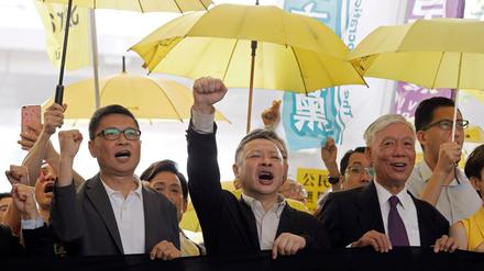 Die Anführer der "Regenschirm-Bewegung", Chan Kin Man, Benny Tai und Chu Yiu Ming (von links nach rechts).
