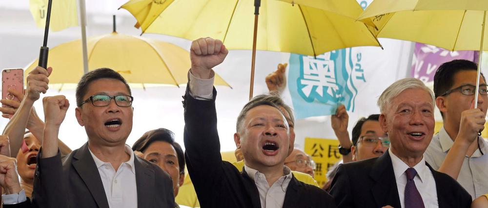 Die Anführer der "Regenschirm-Bewegung", Chan Kin Man, Benny Tai und Chu Yiu Ming (von links nach rechts).