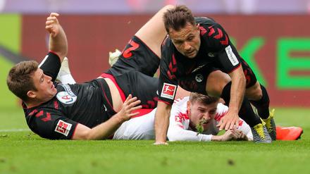 Drunter und drüber. Am Ende sicherten sich die Leipziger mit Timo Werner (unten) die Teilnahme an der Champions League.