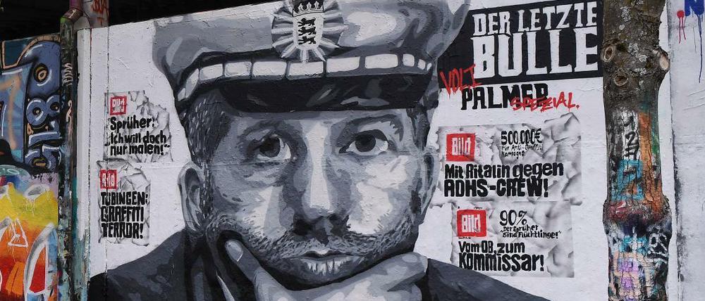 „Der letzte Bulle“: Ein Graffiti auf einer Wand in Tübingen zeigt Boris Palmer als resoluten Politiker.
