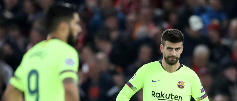 Ratlos. Gerard Pique (rechts) und Luis Suarez erlebten in Liverpool einen der bittersten Abende ihrer Karrieren.