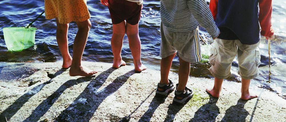 Sonne und Schatten. Kinder sollten unbeschwert leben. Wenn Eltern krebserkrankt sind, ist das schwer. Die Berliner Krebsgesellschaft hilft. 