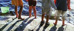 Sonne und Schatten. Kinder sollten unbeschwert leben. Wenn Eltern krebserkrankt sind, ist das schwer. Die Berliner Krebsgesellschaft hilft. 