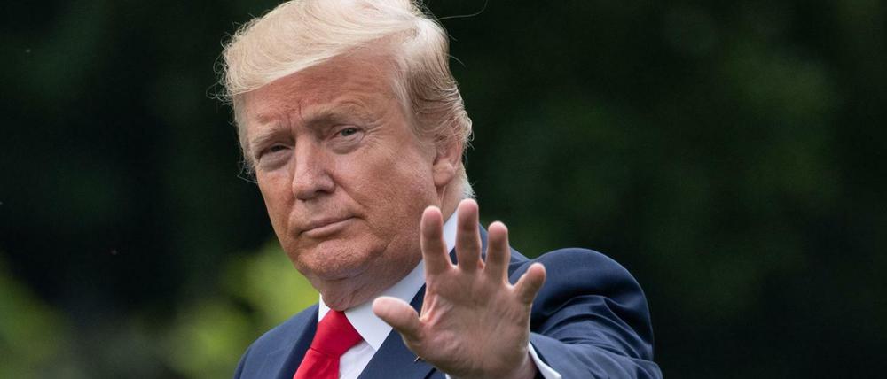 US President Donald Trump waves as he walks to Marine One prior to departing from the South Lawn of the White House in Washington, DC, May 8, 2019, as he travels to Florida to visit Tyndall Air Force Base and hold a "Make America Great Again" rally. (Photo by SAUL LOEB / AFP)