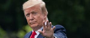 US President Donald Trump waves as he walks to Marine One prior to departing from the South Lawn of the White House in Washington, DC, May 8, 2019, as he travels to Florida to visit Tyndall Air Force Base and hold a "Make America Great Again" rally. (Photo by SAUL LOEB / AFP)