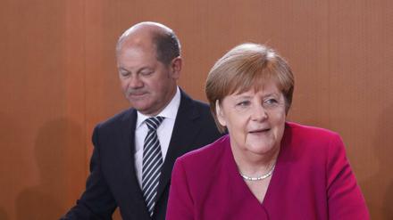 Die Bundeskanzlerin Angela Merkel (CDU) und Bundesfinanzminister Olaf Scholz (SPD). 