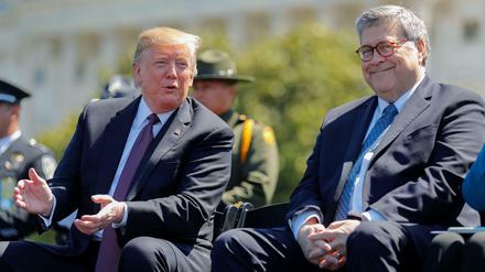 ei Präsident Donald Trump und sein Justizminister William Barr bei einer Veranstaltung auf dem Capitol Hill in Washington. 
