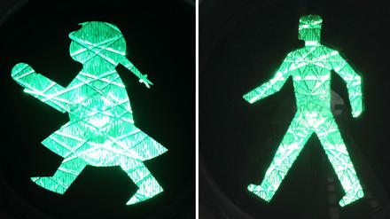 Bildkombo aus einer Ampelfrau (l) und einem Ampelmann, aufgenommen im Kölner Stadtteil Ehrenfeld.