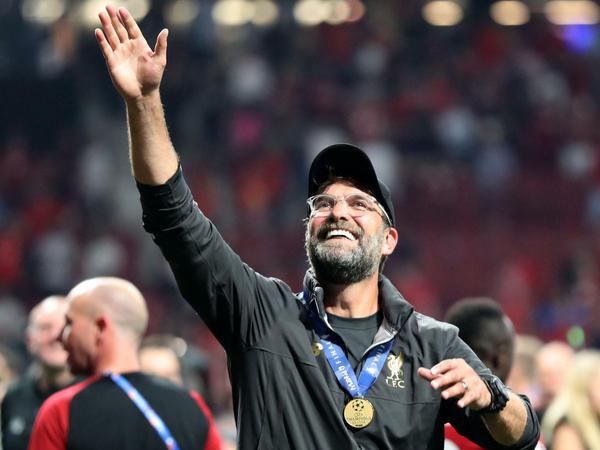 Nach ganz oben: Jürgen Klopp feiert mit dem Champions-League-Titel den größten Erfolg seiner Karriere.