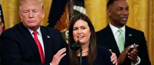 Sarah Sanders und Präsident Donald Trump am Donnerstag (Ortszeit).