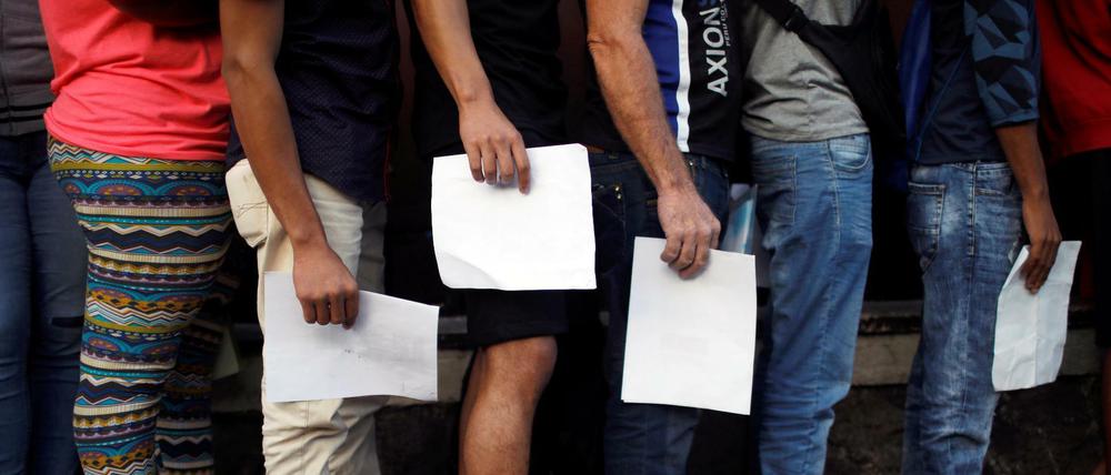Kubanische Migranten an einer Meldestelle in Mexiko 