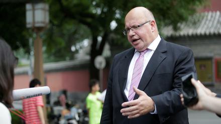 Bei seinem Besuch in China traf Bundeswirtschaftsminister Peter Altmaier auch den Huawei-Gründer Ren Zhengfei.