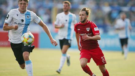 Herbert Paul (Muenchen) und Lucas Cueto (Muenster) liefern sich ein Laufduell.