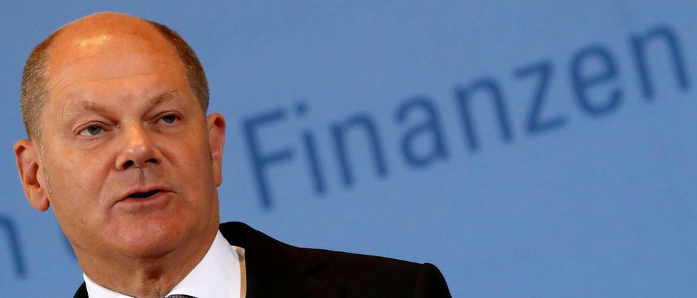FILE PHOTO: Finance Minister Olaf Scholz addresses a news conference in Berlin, Germany, May 9, 2019. REUTERS/Fabrizio Bensch/File Photo