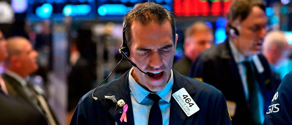 Auf und ab an der Börse. Ein Händler an der New Yorker Wall Street.