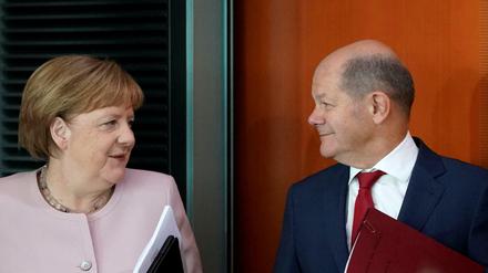 Bundeskanzlerin Angela Merkel (CDU) und Finanzminister Olaf Scholz (SPD).