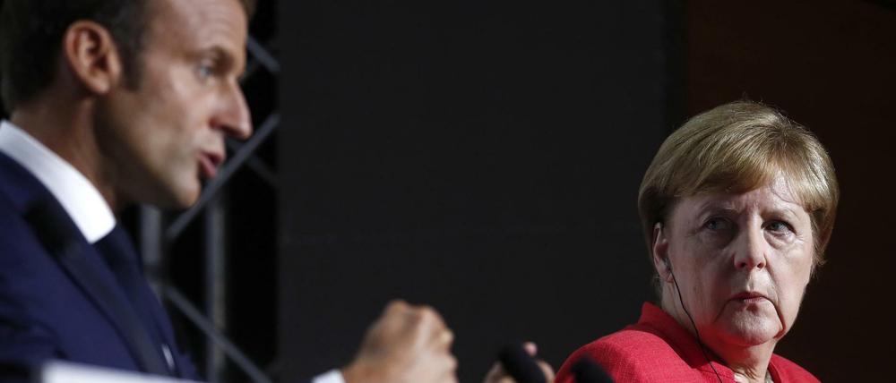 Frankreichs Präsident Emmanuel Macron Bundeskanzlerin Angela Merkel.