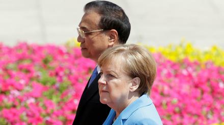 Die deutsche Kanzlerin Angela Merkel und der chinesische Premierminister bei einem Treffen 2018.