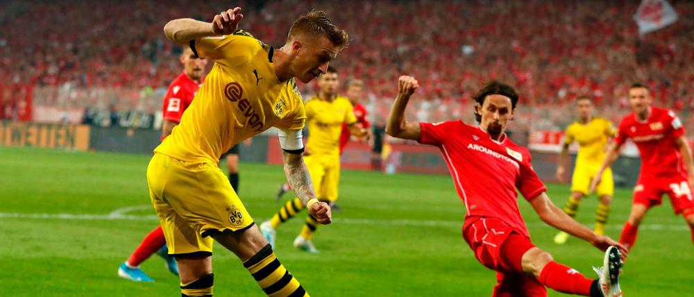 Tiefflieger. Neven Subotic (rechts) und der 1. FC Union hatten Marco Reus' Dortmunder gut im Griff.