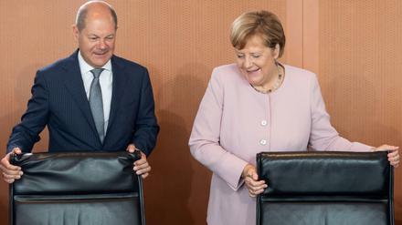 Kanzlerin Angela Merkel (CDU) und Finanzminister Olaf Scholz (SPD).