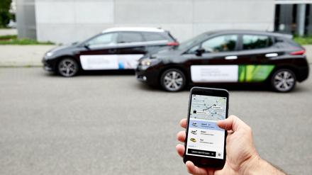 Ubers Fahrzeuge lassen sich per App bestellen.