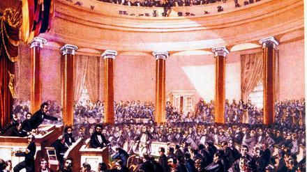  Die Abgeordneten der Nationalversammlung von 1848 tagen in der Frankfurter Paulskirche. 