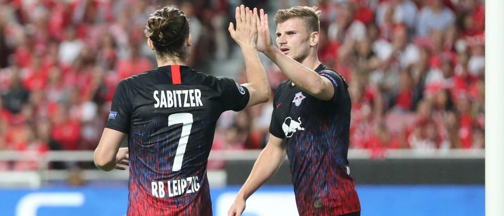 Timo Werner (r.) sorgte in Lissabon für den Sieg von RB Leipzig. 