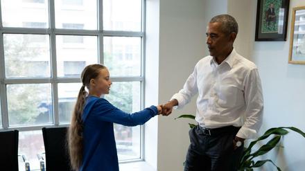 Former US President Barack Obama (R) meets with Swedish Environmental activist Greta Thunberg at the Obama Foundation headquarter in Washington DC on September 16, 2019. - Thunberg will attend the Youth Climate Summit at the UN in New York on September 21, followed by the UN Climate Action Summit on September 23 convened by the Secretary-General Antonio Guterres to find ways for countries to reduce their greenhouse gas emissions in line with the Paris Agreement. (Photo by - / various sources / AFP) / RESTRICTED TO EDITORIAL USE - MANDATORY CREDIT "AFP PHOTO / THE OBAMA FOUNDATION" - NO MARKETING - NO ADVERTISING CAMPAIGNS - DISTRIBUTED AS A SERVICE TO CLIENTS