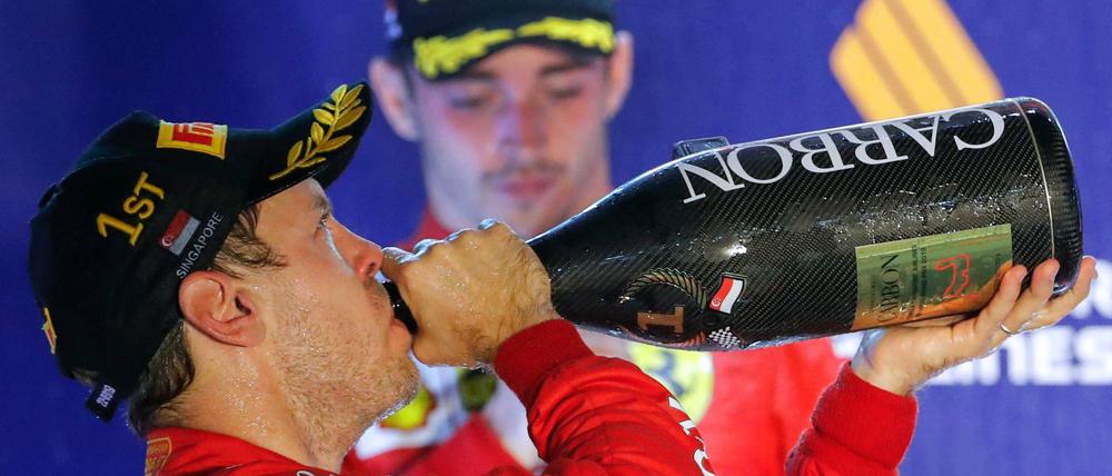 Des einen Freud. Sebastian Vettel (vorne) genießt seinen Sieg über Charles Leclerc.