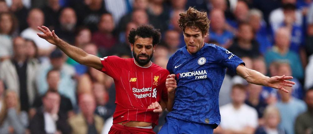 Liverpools Mohamed Salah (links) blieb gegen Chelsea ohne Tor. Zum Sieg reichte es trotzdem.