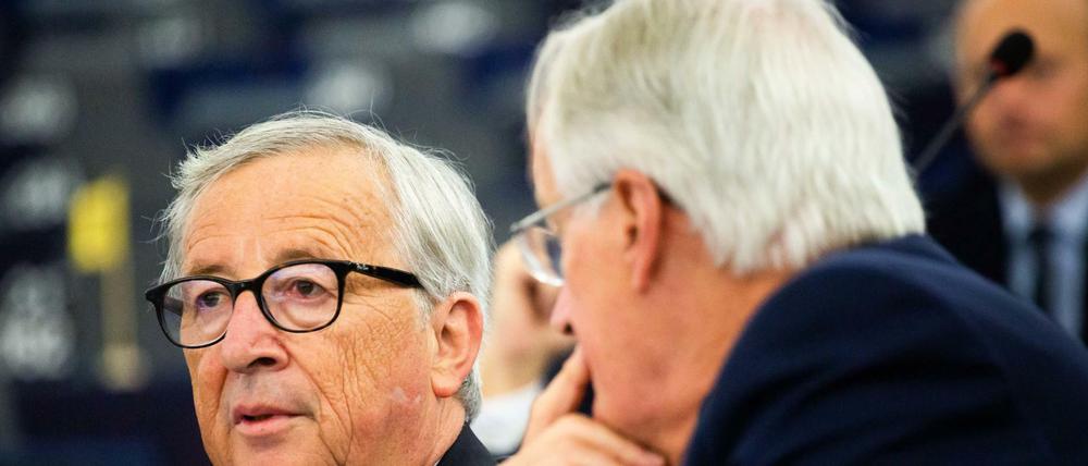 Der Präsident der EU-Kommission, Jean-Claude Juncker und Michel Barnier.