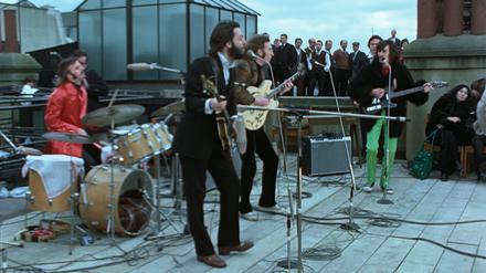 Die Beatles bei ihrem Guerilla-Konzert über den Dächern von London im Januar 1969. Ihr letzter Auftritt.