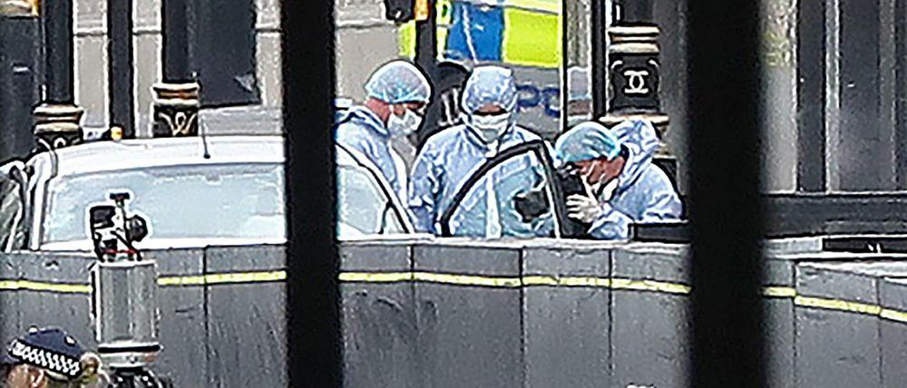 Polizisten im August 2018 vor dem Parlament in London, nach ein Auto in eine Absperrung gefahren war. 