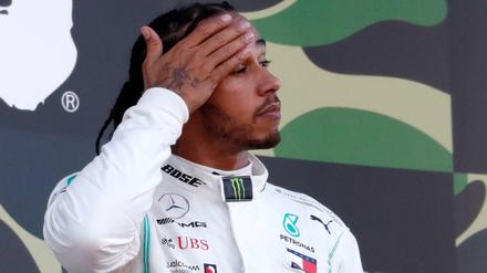 Was will er schon wieder? Lewis Hamiltons Kommentare geben Rätsel auf.