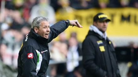Das Phantom im Hintergrund. Lucien Favre (links, hier noch als Trainer von Borussia Mönchengladbach) mit Jürgen Klopp. 