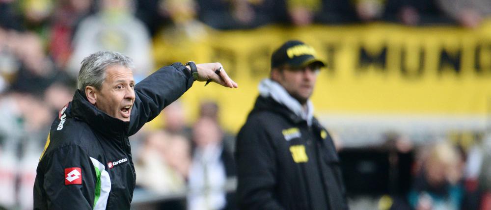 Das Phantom im Hintergrund. Lucien Favre (links, hier noch als Trainer von Borussia Mönchengladbach) mit Jürgen Klopp.
