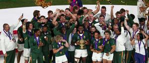 Lametta für alle: Südafrika feiert den dritten WM-Titel mit Grün und Gold.