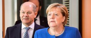 Angela Merkel und Olaf Scholz