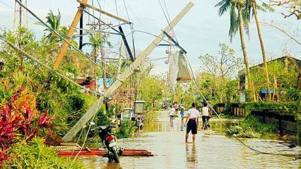 Der steigende Meeresspiegel bedroht die Existenz von Küstenbewohnern wie auf den Philippinen.