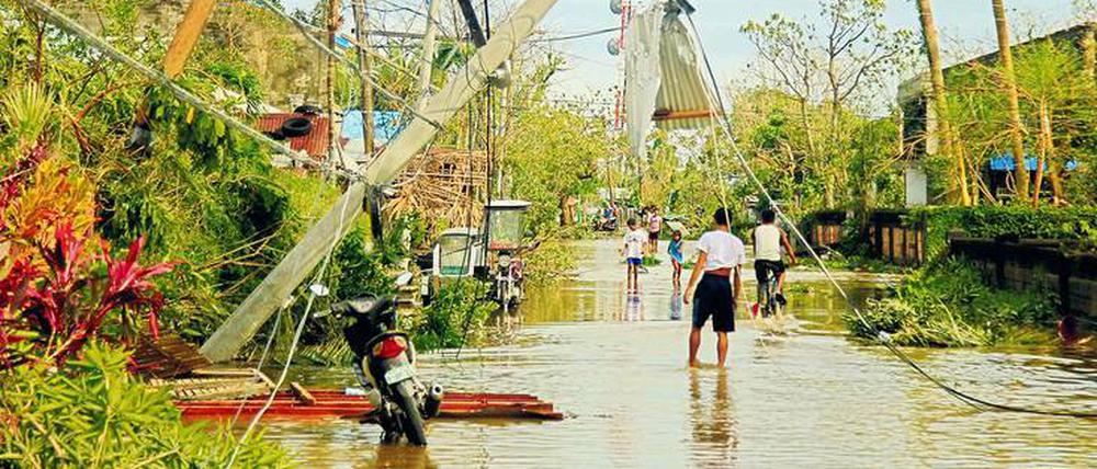 Der steigende Meeresspiegel bedroht die Existenz von Küstenbewohnern wie auf den Philippinen.