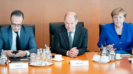 Heiko Maas SPD), Außenminister, Olaf Scholz (SPD), Bundesminister der Finanzen, und Angela Merkel (CDU), Bundeskanzlerin