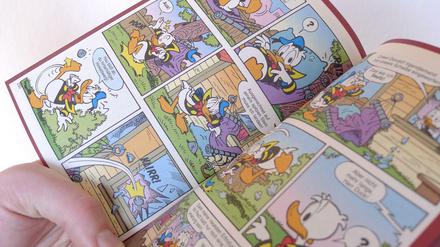 Inzwischn auch als eComic erhältlich: Das Lustige Taschenbuch, hier eine Doppelseite aus dem Band 300.