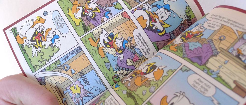 Inzwischn auch als eComic erhältlich: Das Lustige Taschenbuch, hier eine Doppelseite aus dem Band 300.