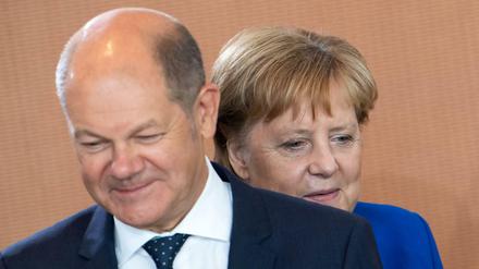 Olaf Scholz (SPD), Bundesfinanzminister, und Bundeskanzlerin Angela Merkel (CDU) 