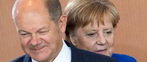 Olaf Scholz (SPD), Bundesfinanzminister, und Bundeskanzlerin Angela Merkel (CDU) 