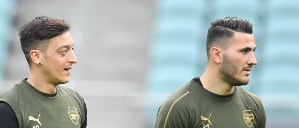 Opfer eines Raubüberfalls: Mesut Özil und Sead Kolasinac 