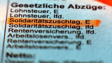 Wird bald auf vielen Lohnabrechnungen keine Rolle mehr spielen: die Position Solidaritätszuschlag.