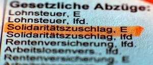 Wird bald auf vielen Lohnabrechnungen keine Rolle mehr spielen: die Position Solidaritätszuschlag.