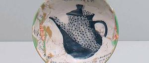 Keramischer Teller mit Kannenmotiv